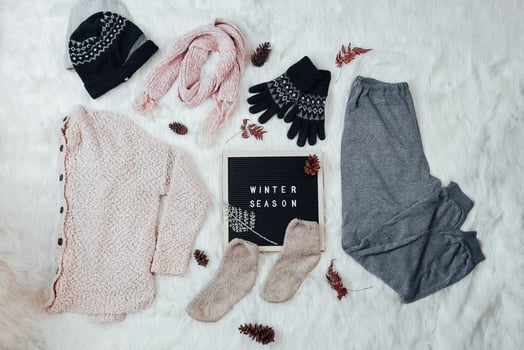 Creative flat lay composition for winter fashion background photo