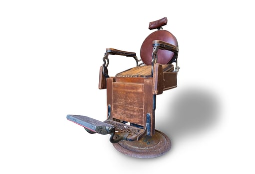 Old barber chair isolated on white background, Vintage Barber Chair on white photo