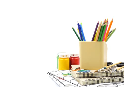 Set of colorful school stationery on white background photo