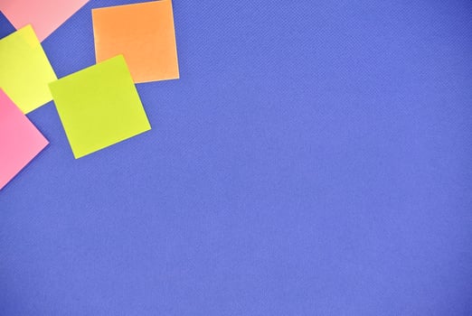 Paper note multiple color on blue background for copy space , message, information, text , advertisement , announcement and other. colorful paper note and space photo