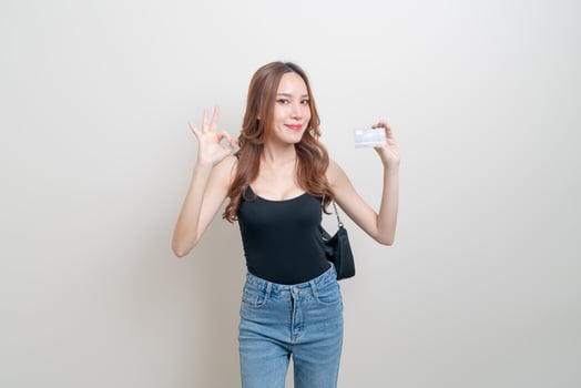 portrait beautiful Asian woman holding credit card photo