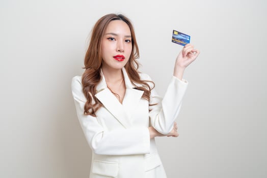 portrait beautiful Asian woman holding credit card photo