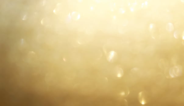 Abstract gold glister Christmas light bokeh background. photo