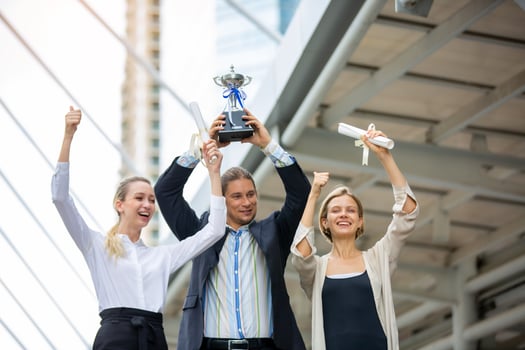 Successful business people standing together widen out showing strong relationship of worker community. A team of businessman and businesswoman expressing a strong group teamwork at the modern office. photo