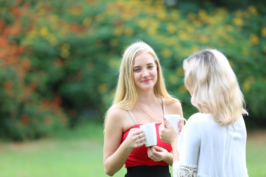 Portrait of two young friends outdoors. photo