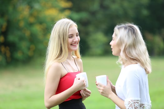 Portrait of two young friends outdoors. photo