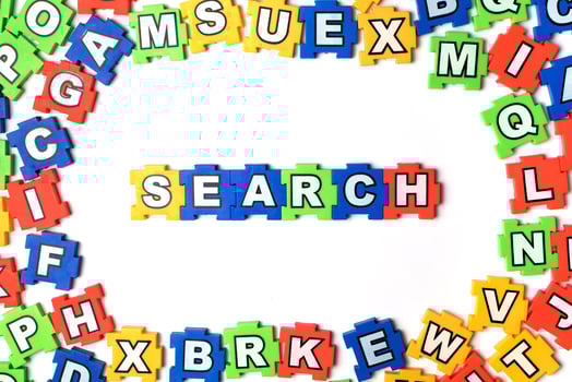 Puzzle search on white background photo