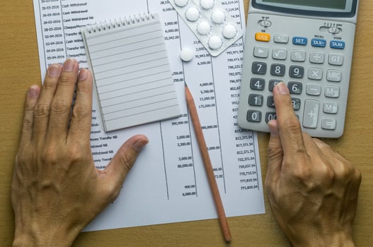 Man planning monthly budget, Finance about health concept photo