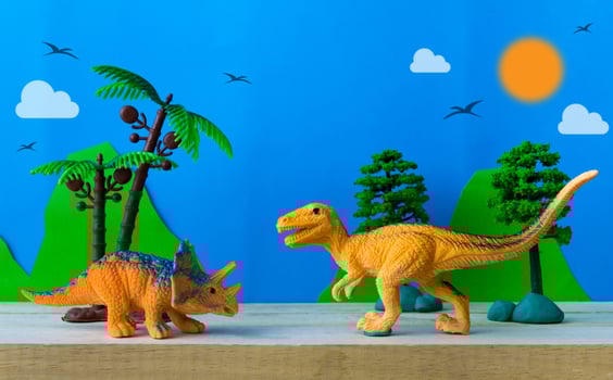 Dinosaur fight scene on wild models background photo