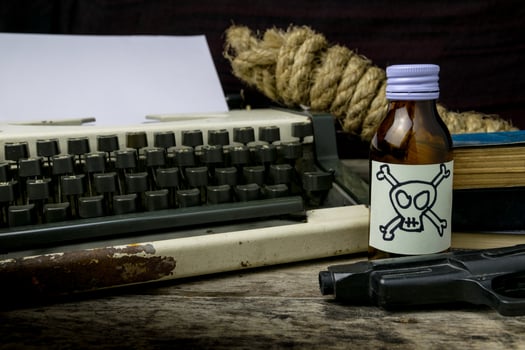 Typewriter with paper page and poison and gun. Concept writer Romance Suspense photo