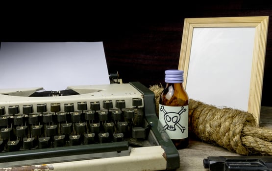 Typewriter with paper page and poison and gun. Concept writer Romance Suspense photo
