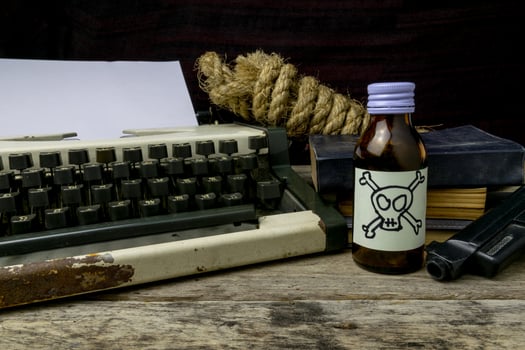 Typewriter with paper page and poison and gun. Concept writer Romance Suspense photo