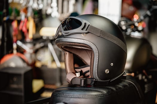 motorcycle helmets at motorcycle garage , selective focus photo