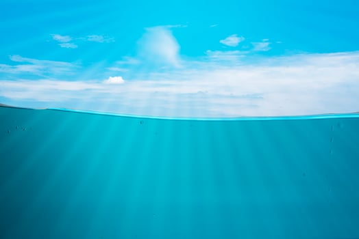 blue sea waves stopped steaming with separate bubbles on a white background. Popular corners, natural concepts photo