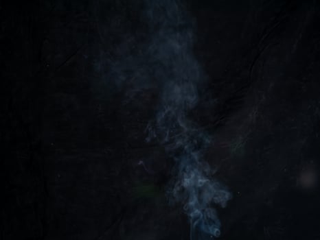 smoke texture on black background. photo