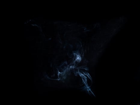 smoke texture on black background. photo