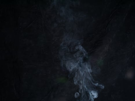smoke texture on black background. photo