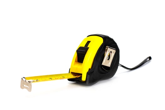 yellow  tape measure  isolated on white background photo