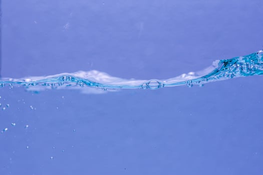 Water and air bubbles over white background with space for text photo