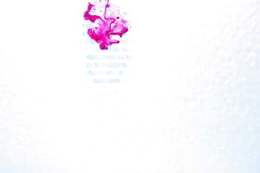 Color ink drop in water. Abstract background photo
