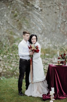 the bride and groom. wedding ceremony on the background of the mountains photo