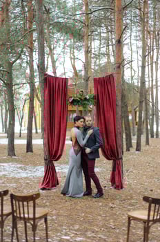 Wedding ceremony for two near the red arch photo