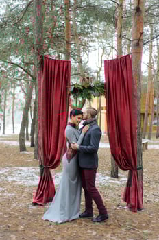 Wedding ceremony for two near the red arch photo