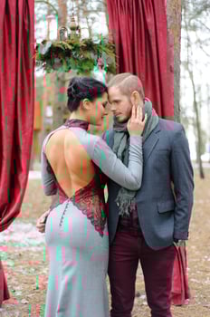 Wedding ceremony for two near the red arch photo