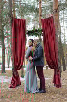 Wedding ceremony for two near the red arch photo
