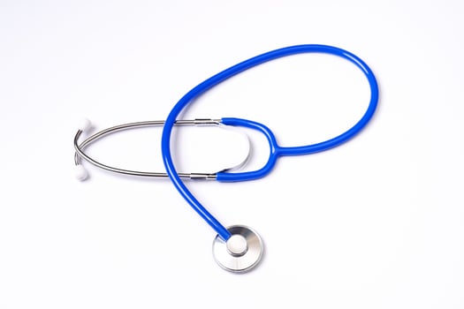 Blue stethoscope,object of doctor equipment,isolated on white background. Medical design concept,cut out,clipping path,top view,studio shot. photo