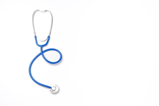 Blue stethoscope,object of doctor equipment,isolated on white background. Medical design concept,cut out,clipping path,top view,studio shot. photo
