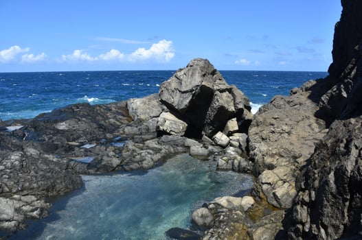 Scenic Shallow Tidal Pool Along Arubas Coast photo