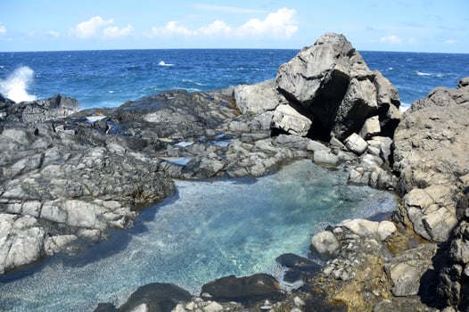 Serene Natural Pool on the Coast of Aruba photo