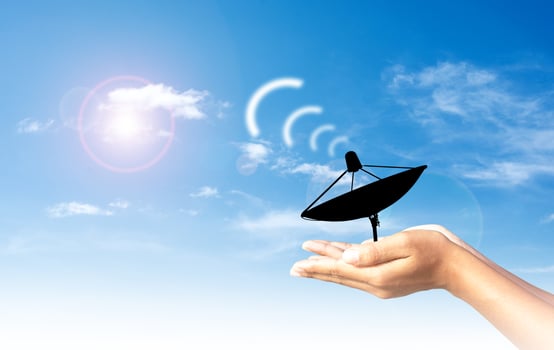 Satellite TV in the human hand photo