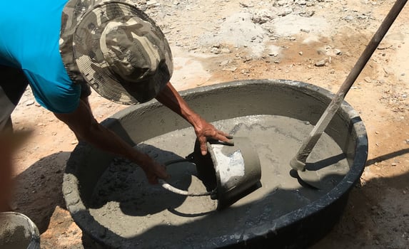 Mixing cement for the construction of houses. photo