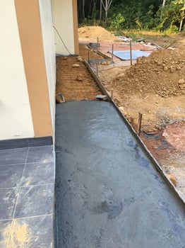 The construction of a cement floor house. photo