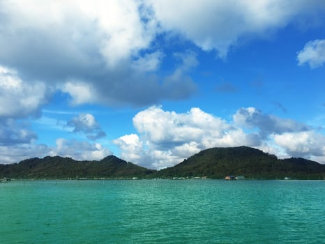 Beachside mountains in thailand photo