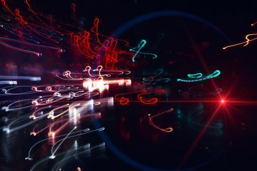 defocused street lights at night in the city photo