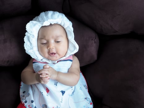 Baby Asian girl dress up in cute fashion dresses for newborn babies photo