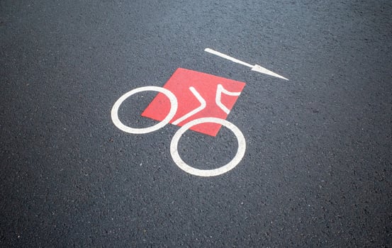 Road sign bike lane on asphalt photo