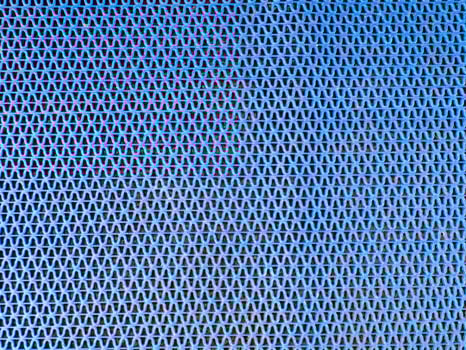 The blue rubber surfaces that cross each other create a pattern. Crabs on the ground, making walking and treading not slippery. photo