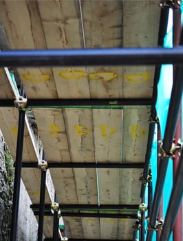 Temporary scaffold for construction works at building site photo