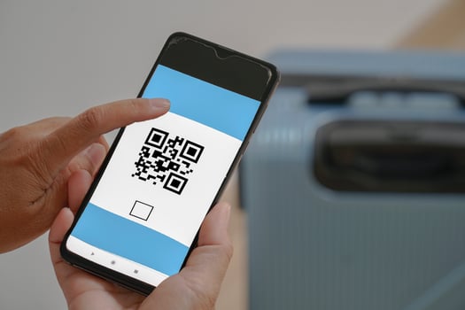 Concept of scanning a mobile QR CODE on a mobile phone. photo