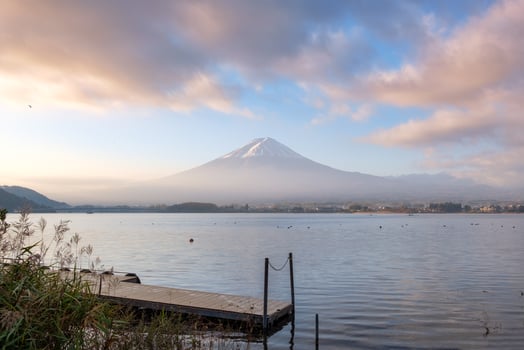 Scenic Mount Fuji and wooden port with colorful sky in Kawaguchiko lake photo