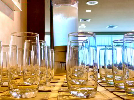 Preparing glass and tower water for seminars or training class or for drink while coffee break photo