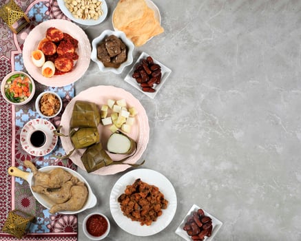 Ketupat Lebaran Ied Menu Dish, Opor Ayam, Sambal Goreng Ati Kentang, Balado Telur, Dates Fruit, Sambal, and Tea. photo