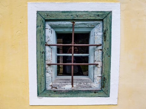 Closeup shot of an old wooden window of a house photo