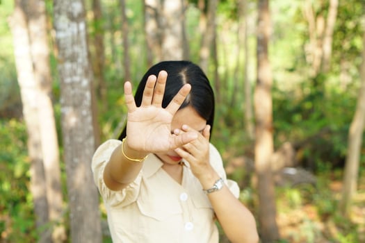 Woman raised her hand for dissuade, campaign stop violence against women photo