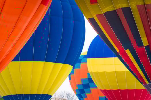 Closeup of colorful Hot Air Ballon flying in the sky. photo