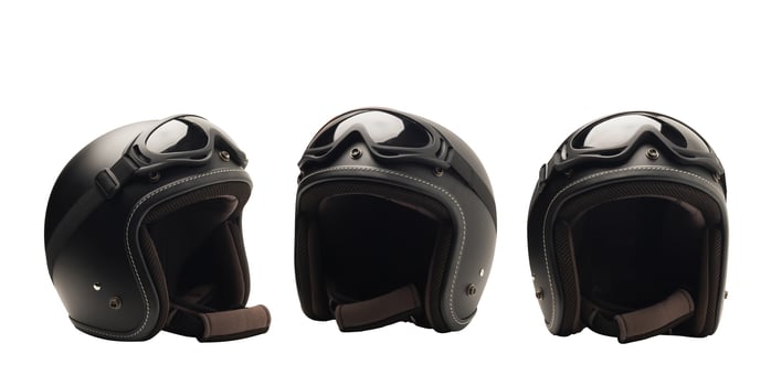 Vintage motorcycle helmets on a white background.Isolated photo